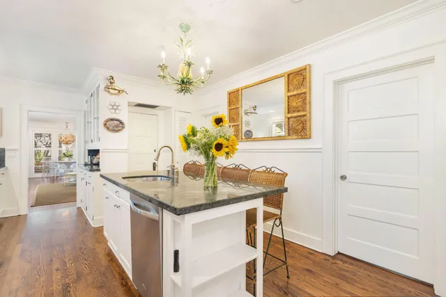 a bathroom with a double vanity sink mirror and