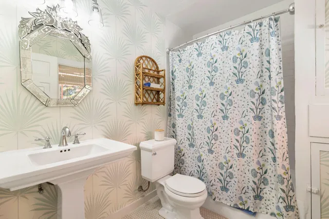 a view of two chairs in the balcony