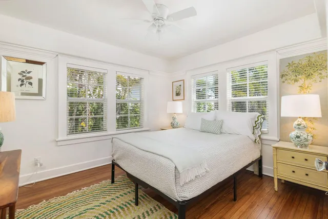 a front view of a house with outdoor seating