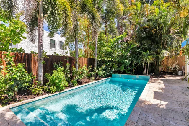 a view of a chairs and table in the patio
