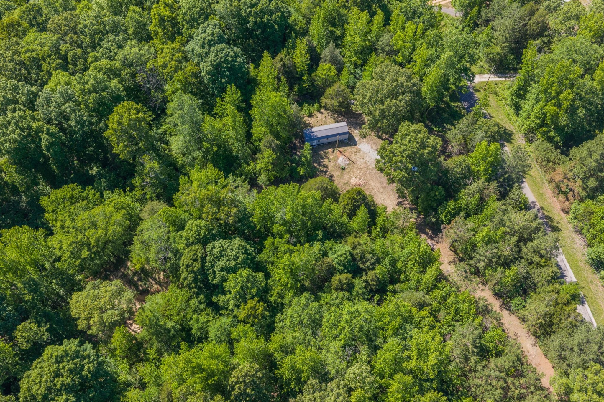 967 Little Jim Road Camden, TN 38320 - Photo 13 of 25 an aerial view of a house with a yard