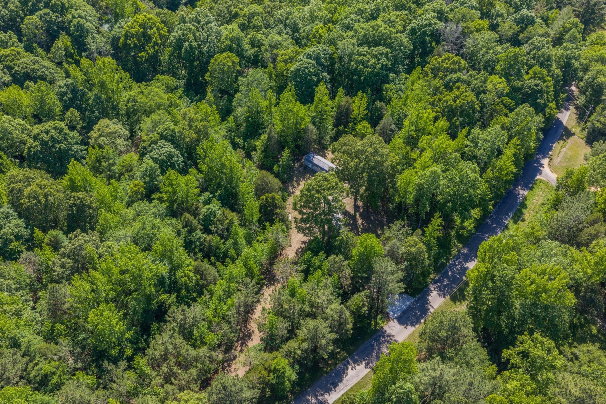 967 Little Jim Road Camden, TN 38320 - Photo 18 of 25 an aerial view of a house with a yard