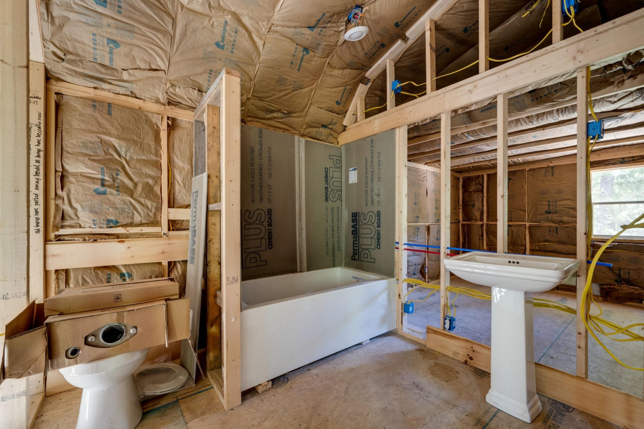 967 Little Jim Road Camden, TN 38320 - Photo 25 of 25 a bathroom with a bathtub and a toilet