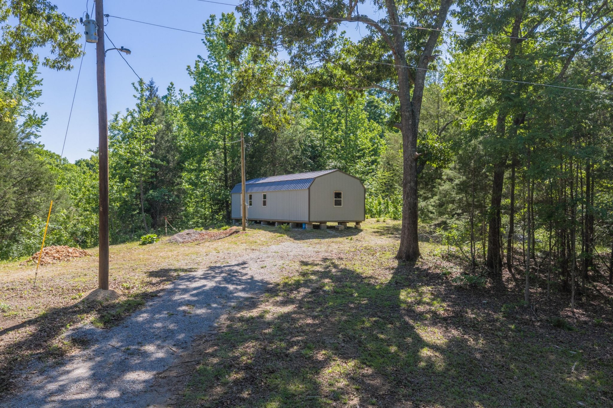 967 Little Jim Road Camden, TN 38320 - Photo 4 of 25 a house view with a backyard space
