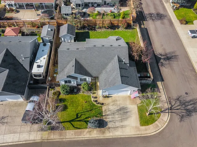 an aerial view of houses with outdoor space