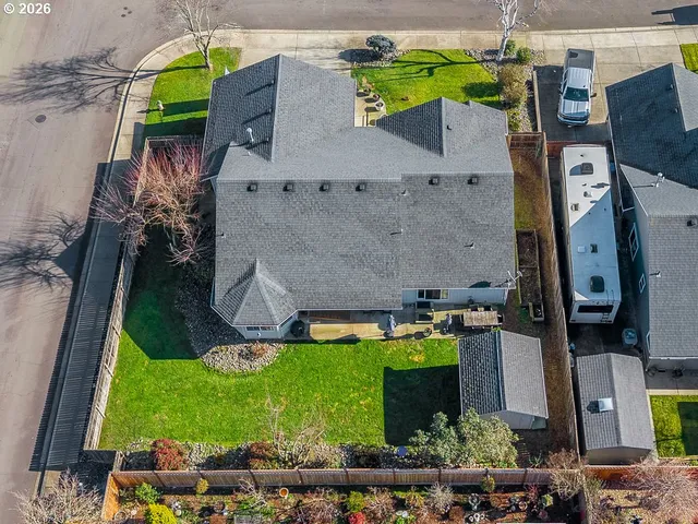a aerial view of a house with a garden and plants