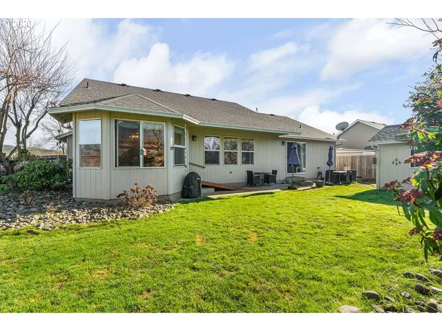 a view of a house with a swimming pool