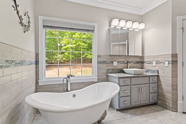 1190 Maple Grove Road Morganton, GA 30560 - Photo 49 of 96 a bathroom with a sink and a mirror
