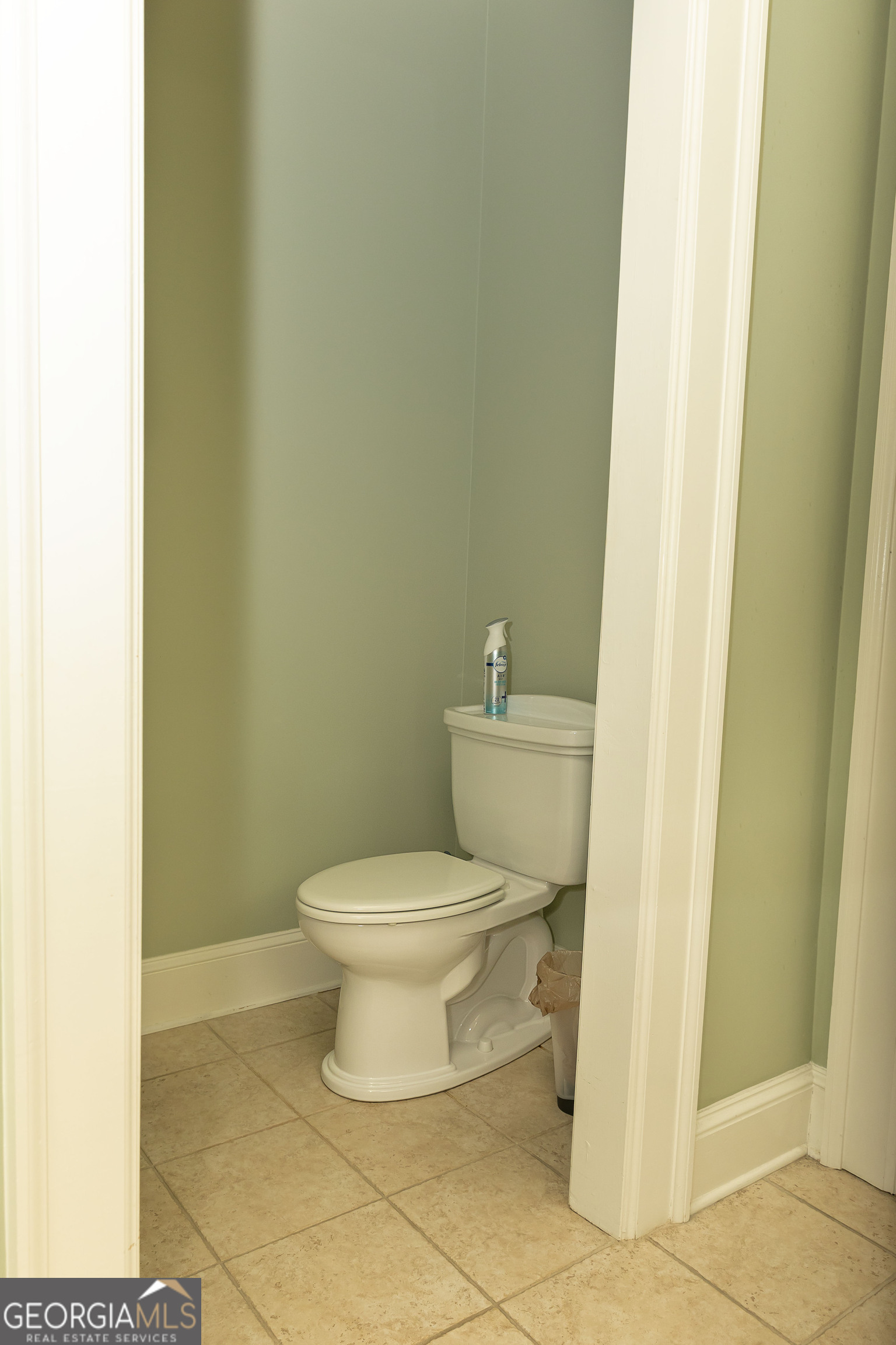 102 Arbors Court Dublin, GA 31021 - Photo 11 of 33 a white toilet sitting next to a sink
