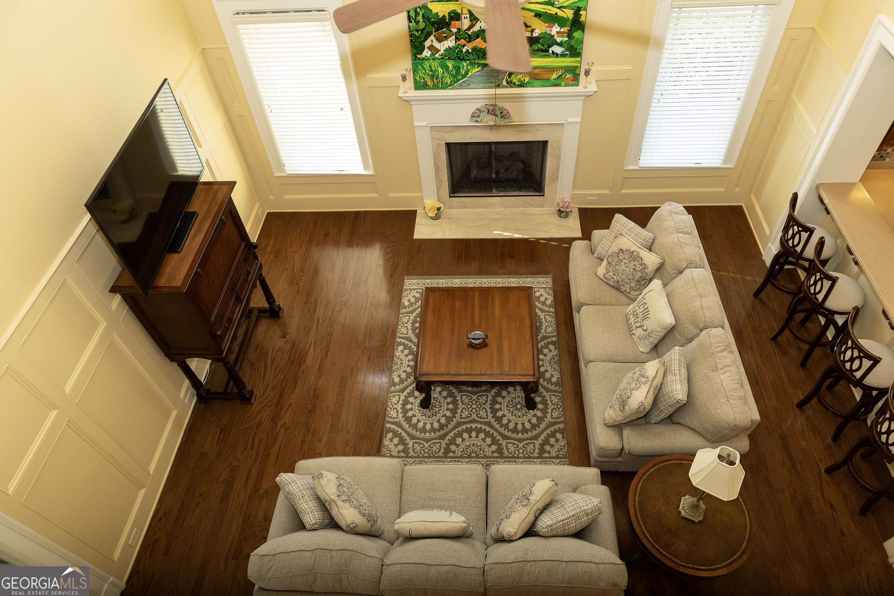 102 Arbors Court Dublin, GA 31021 - Photo 18 of 33 a living room with furniture and a fireplace