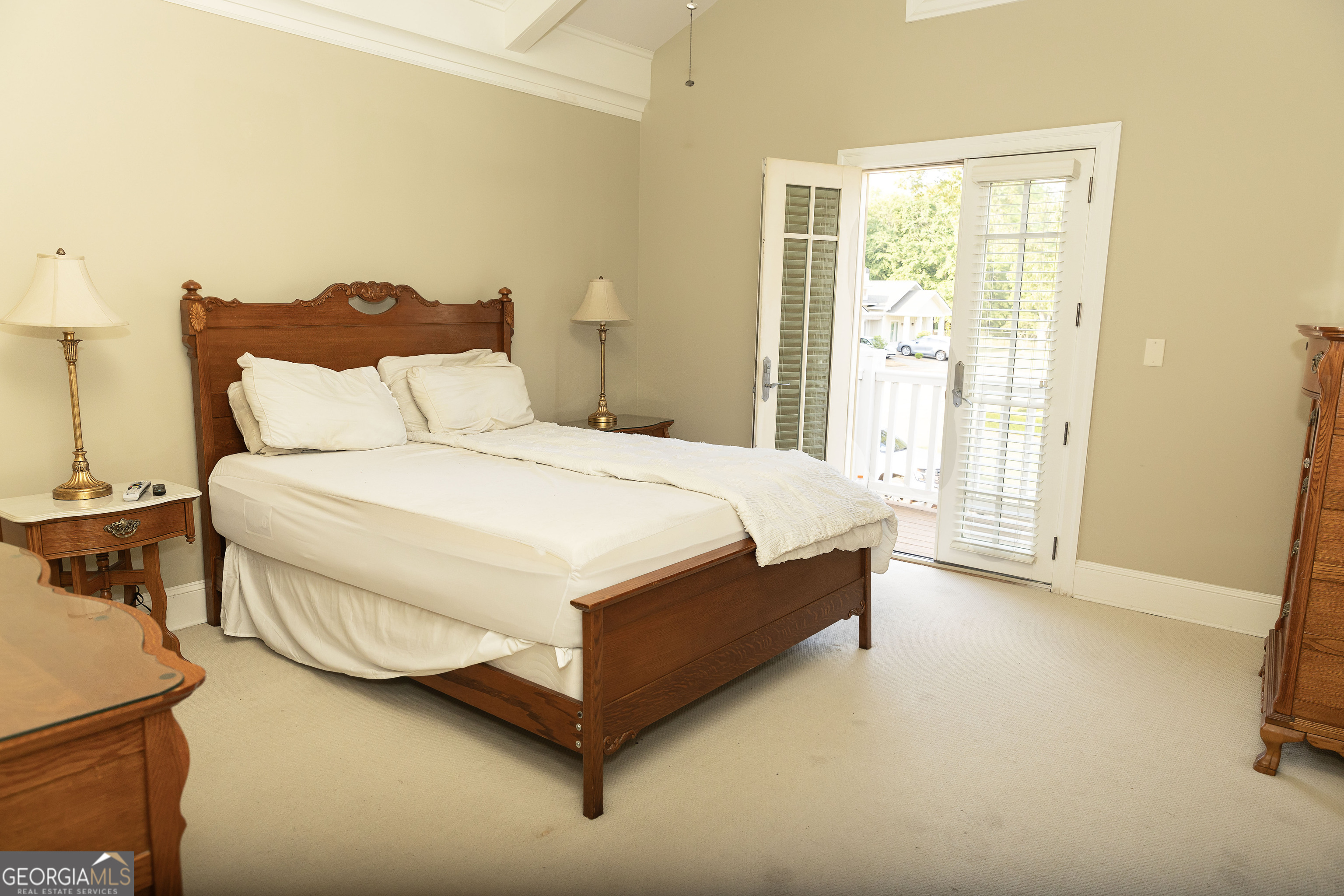 102 Arbors Court Dublin, GA 31021 - Photo 21 of 33 a bed sitting in a bedroom next to a window