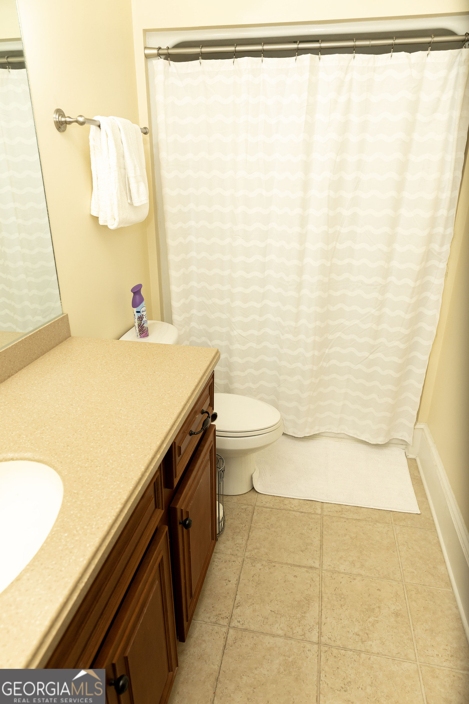 102 Arbors Court Dublin, GA 31021 - Photo 27 of 33 a bathroom with a sink and a mirror