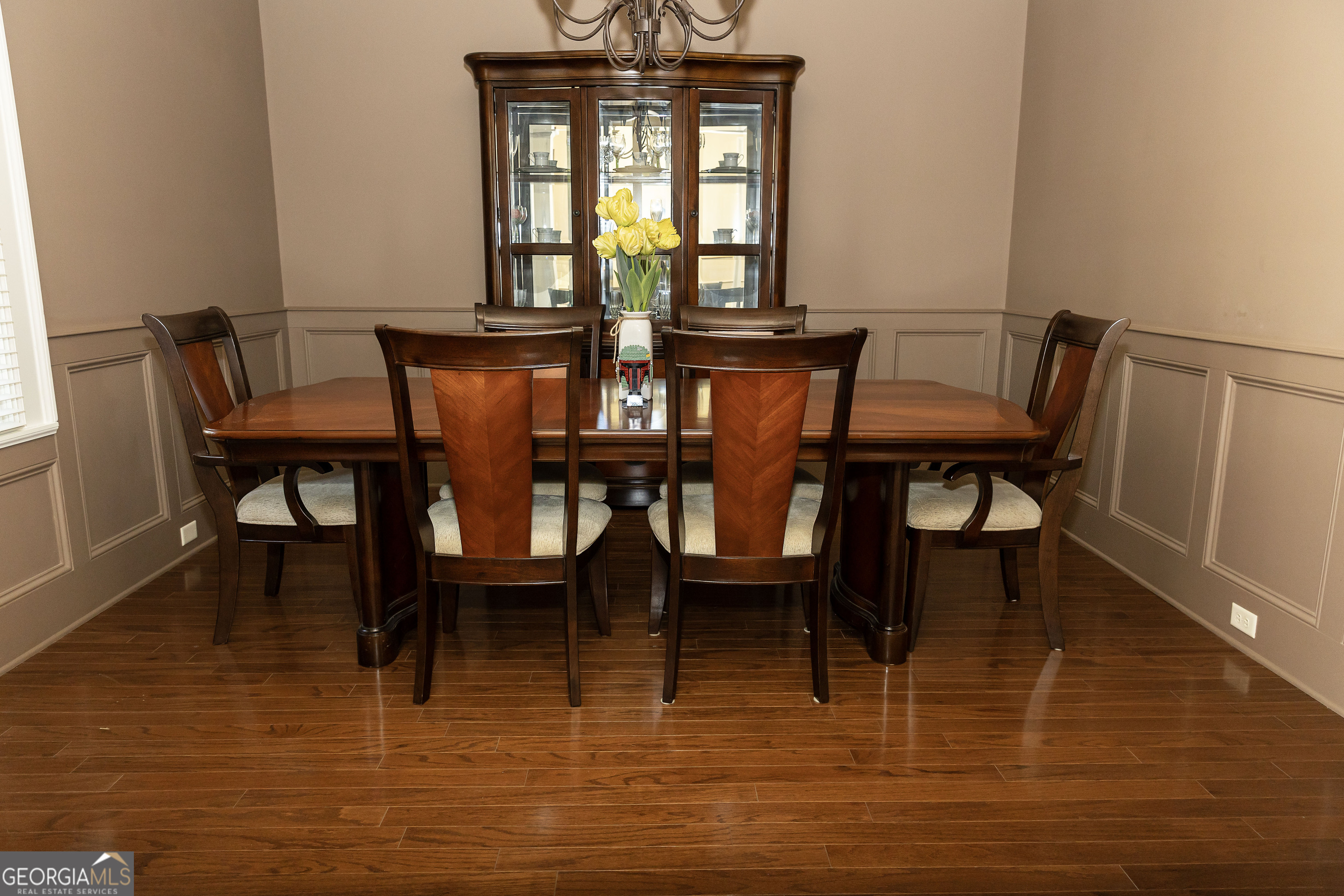 102 Arbors Court Dublin, GA 31021 - Photo 3 of 33 a view of a dining room with furniture and wooden floor