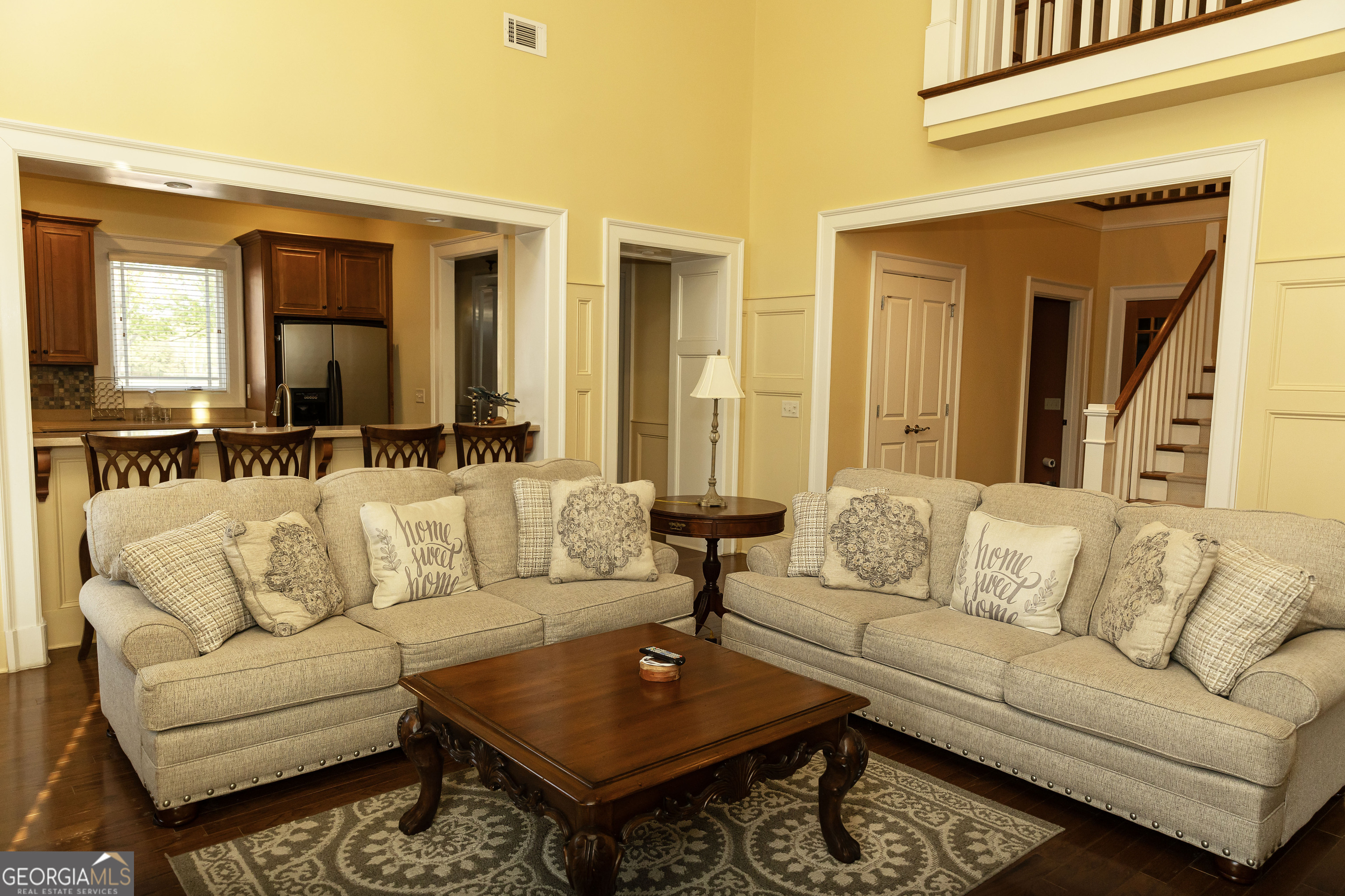 102 Arbors Court Dublin, GA 31021 - Photo 31 of 33 a living room with furniture and a large window