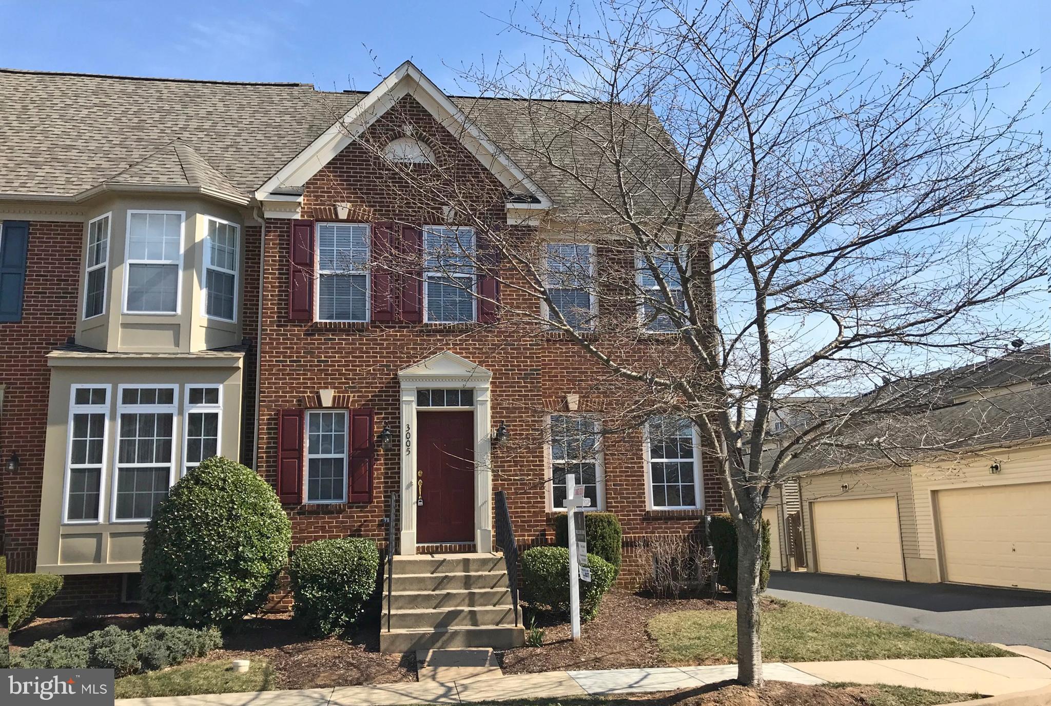 3005 Annas Terrace Frederick, MD 21701 - Photo 1 of 29 a front view of a house with a yard