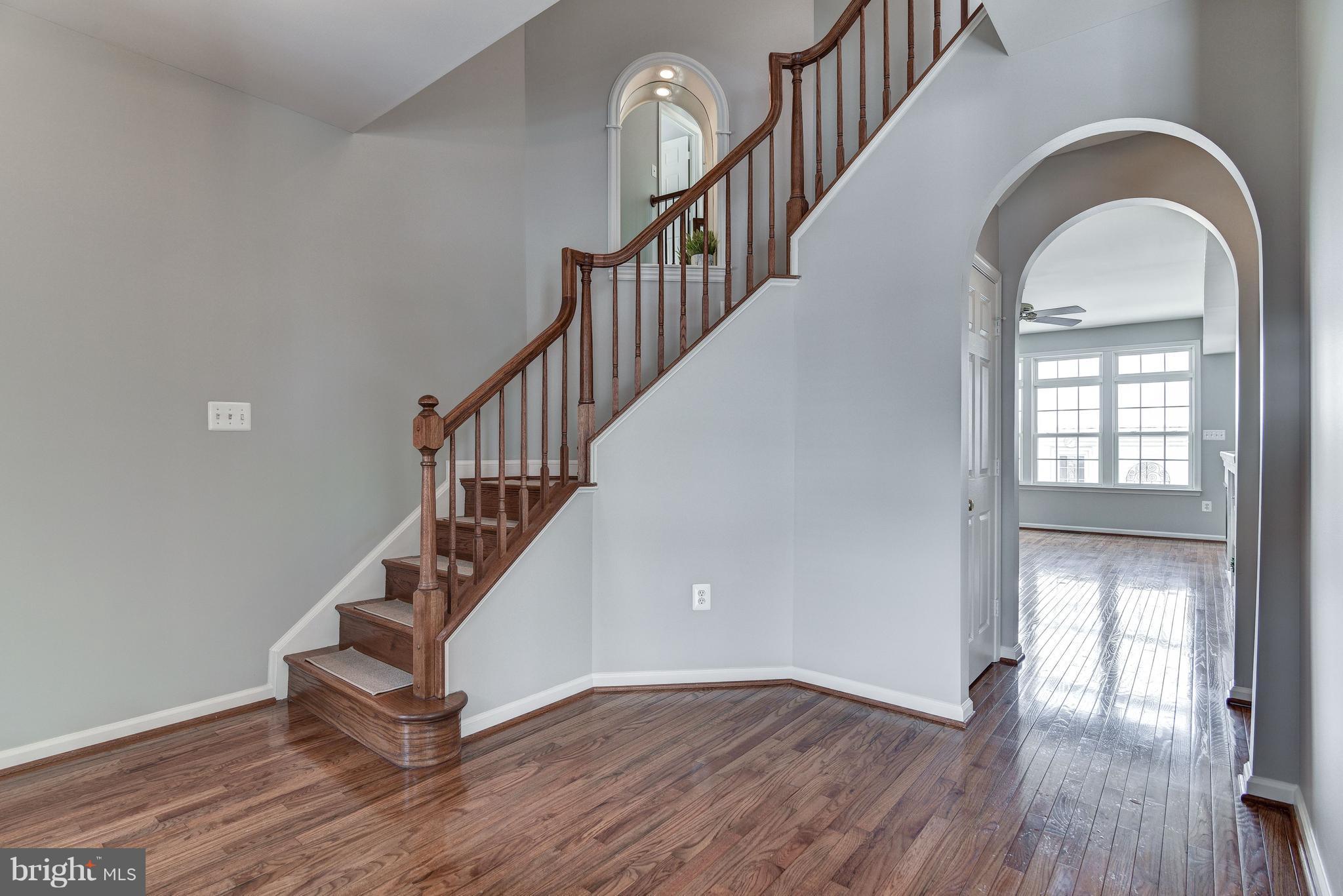3005 Annas Terrace Frederick, MD 21701 - Photo 2 of 29 a view of entryway and hall with wooden floor