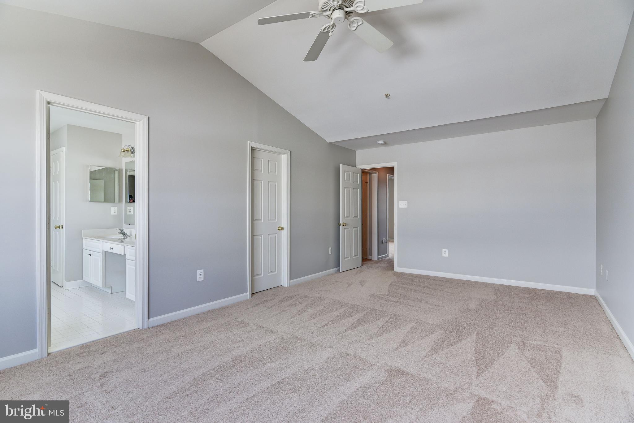 3005 Annas Terrace Frederick, MD 21701 - Photo 16 of 29 a view of a livingroom with a chandelier fan and windows