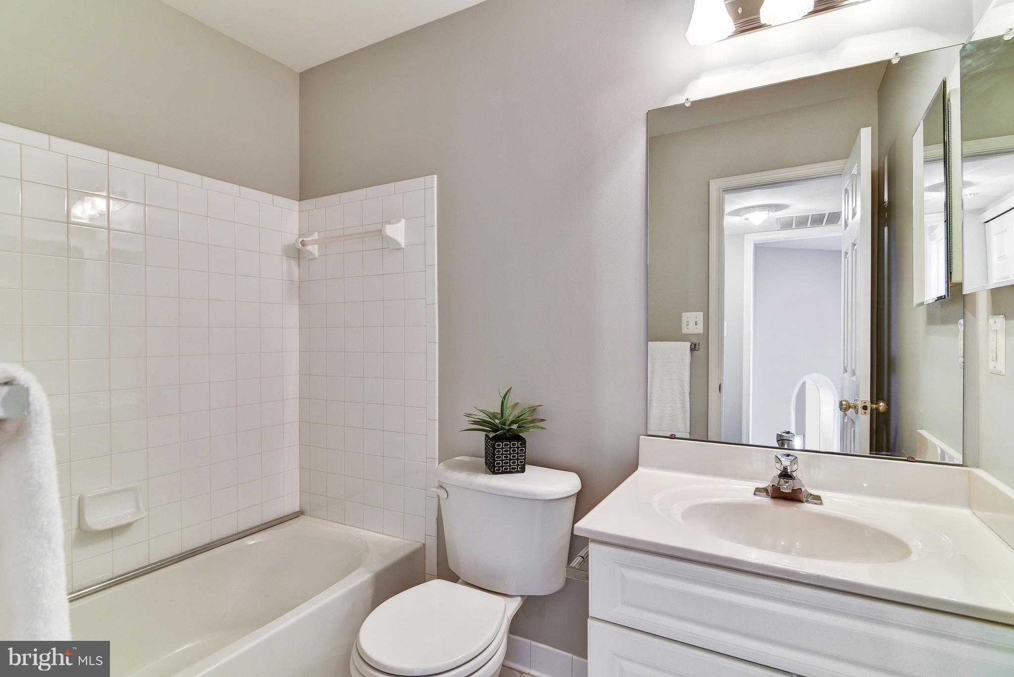 3005 Annas Terrace Frederick, MD 21701 - Photo 21 of 29 a bathroom with a sink toilet and shower