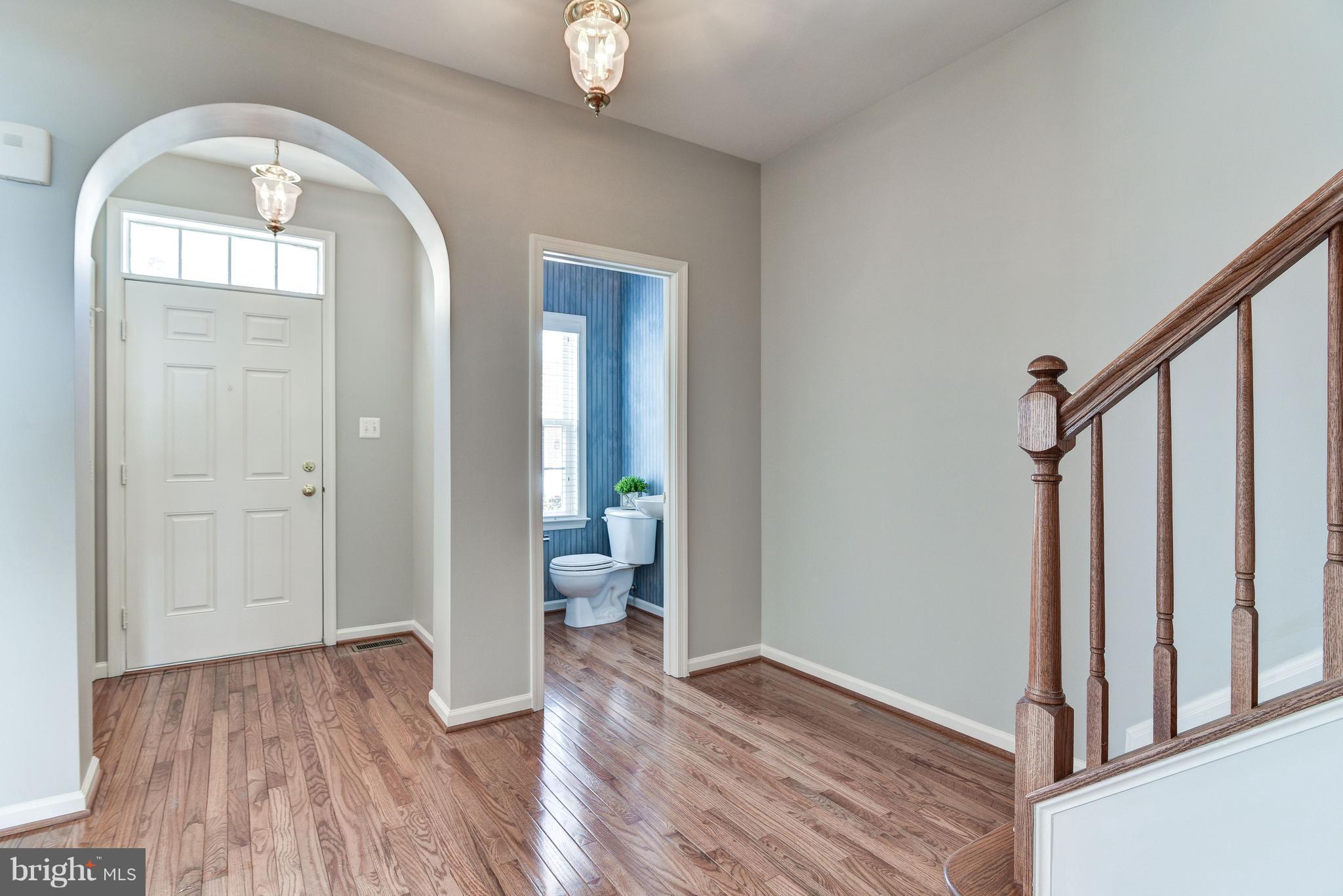 3005 Annas Terrace Frederick, MD 21701 - Photo 5 of 29 a view of livingroom with furniture and wooden floor