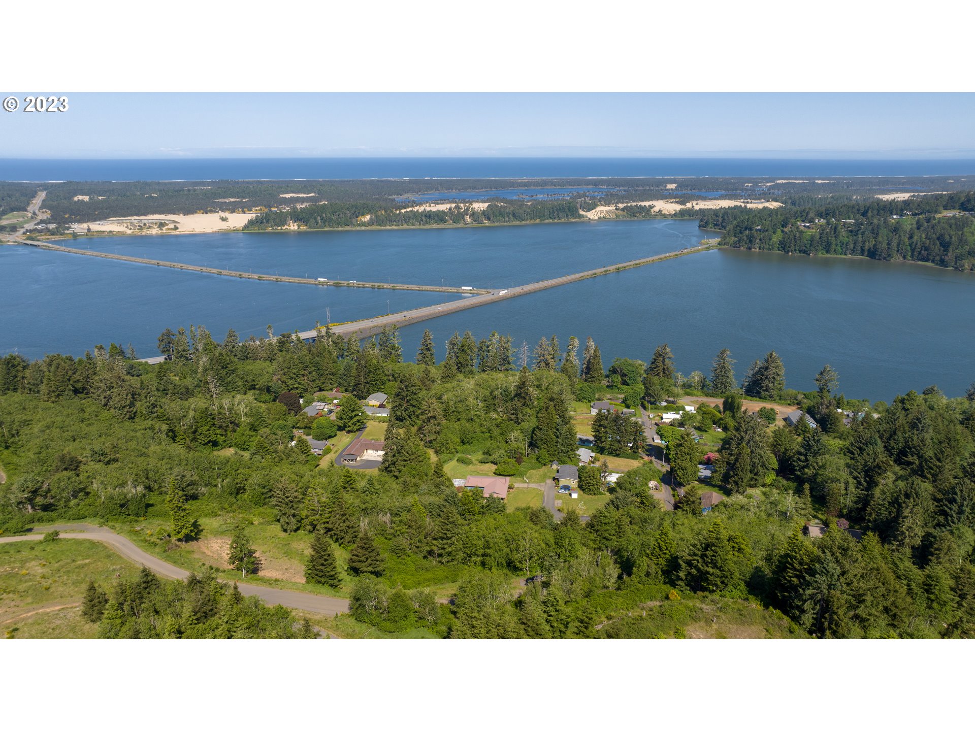 0 Fiddle Back Road North Bend, OR 97459 - Photo 2 of 19 a view of a city with an ocean