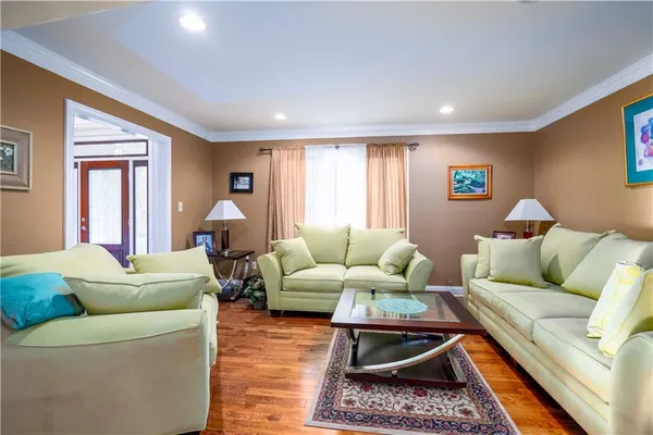 a living room with furniture and a couch