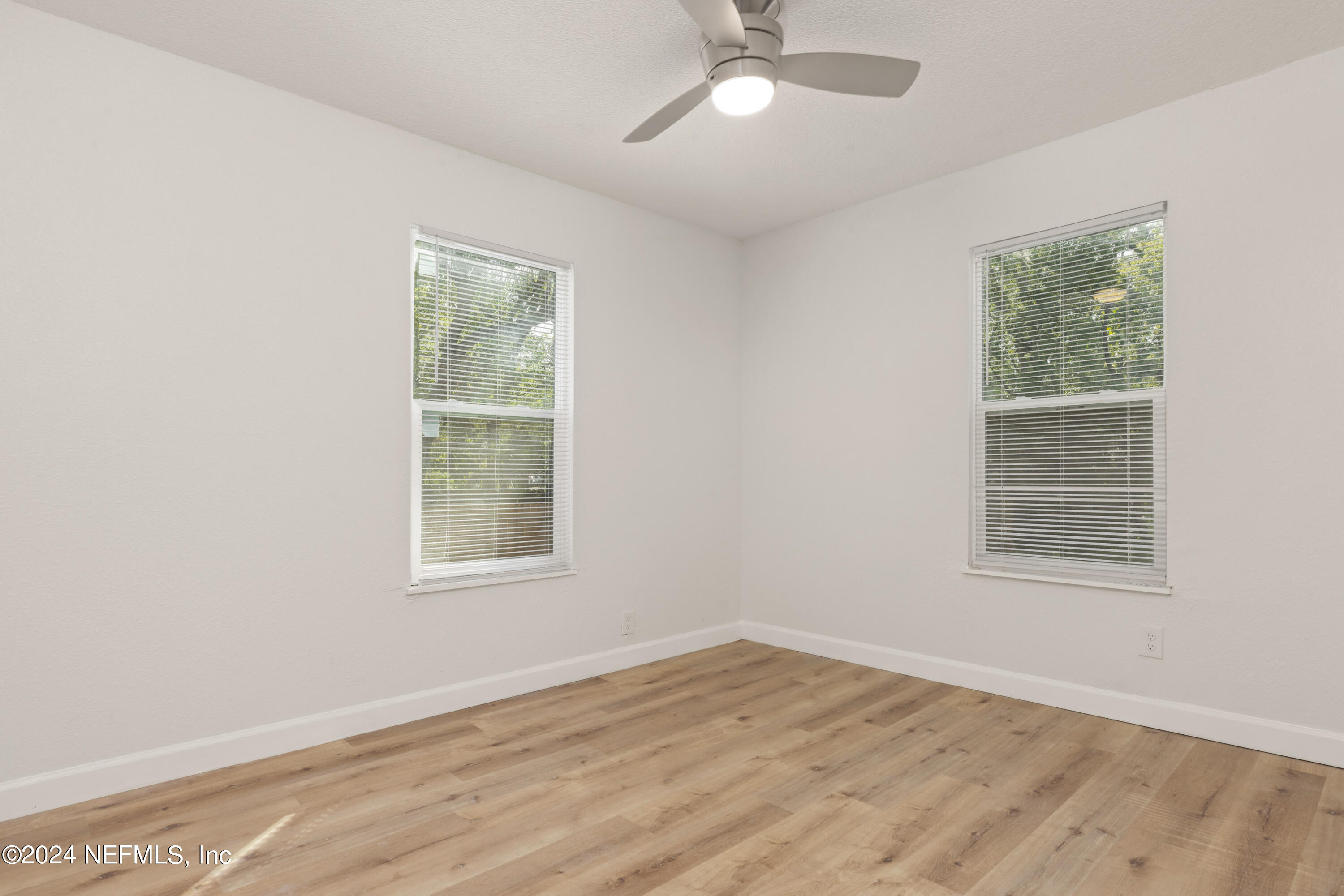 2448 Parental Home Road Jacksonville, FL 32216 - Photo 14 of 21 an empty room with a window