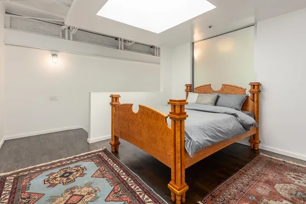 a room with furniture and wooden floor