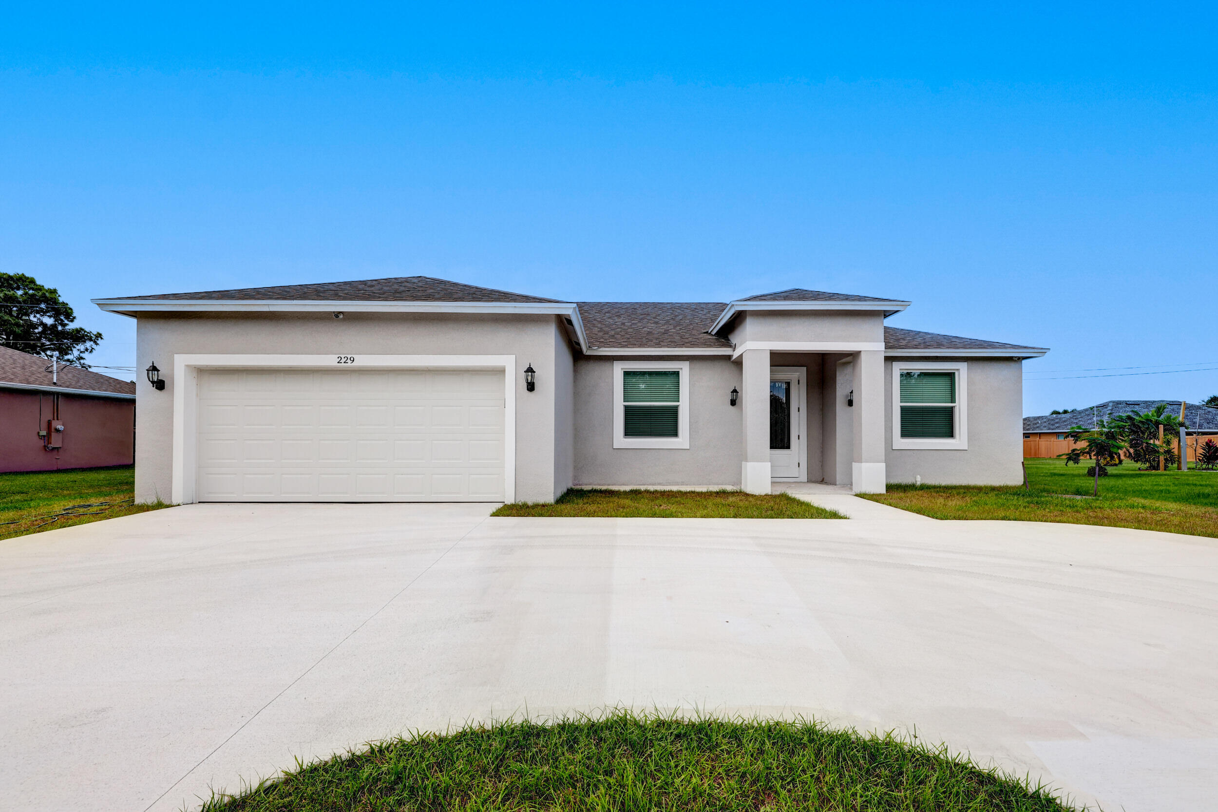 229 Southwest Becker Road Port St. Lucie, FL 34953 - Photo 1 of 23 01_632a9486_87_88_89_90