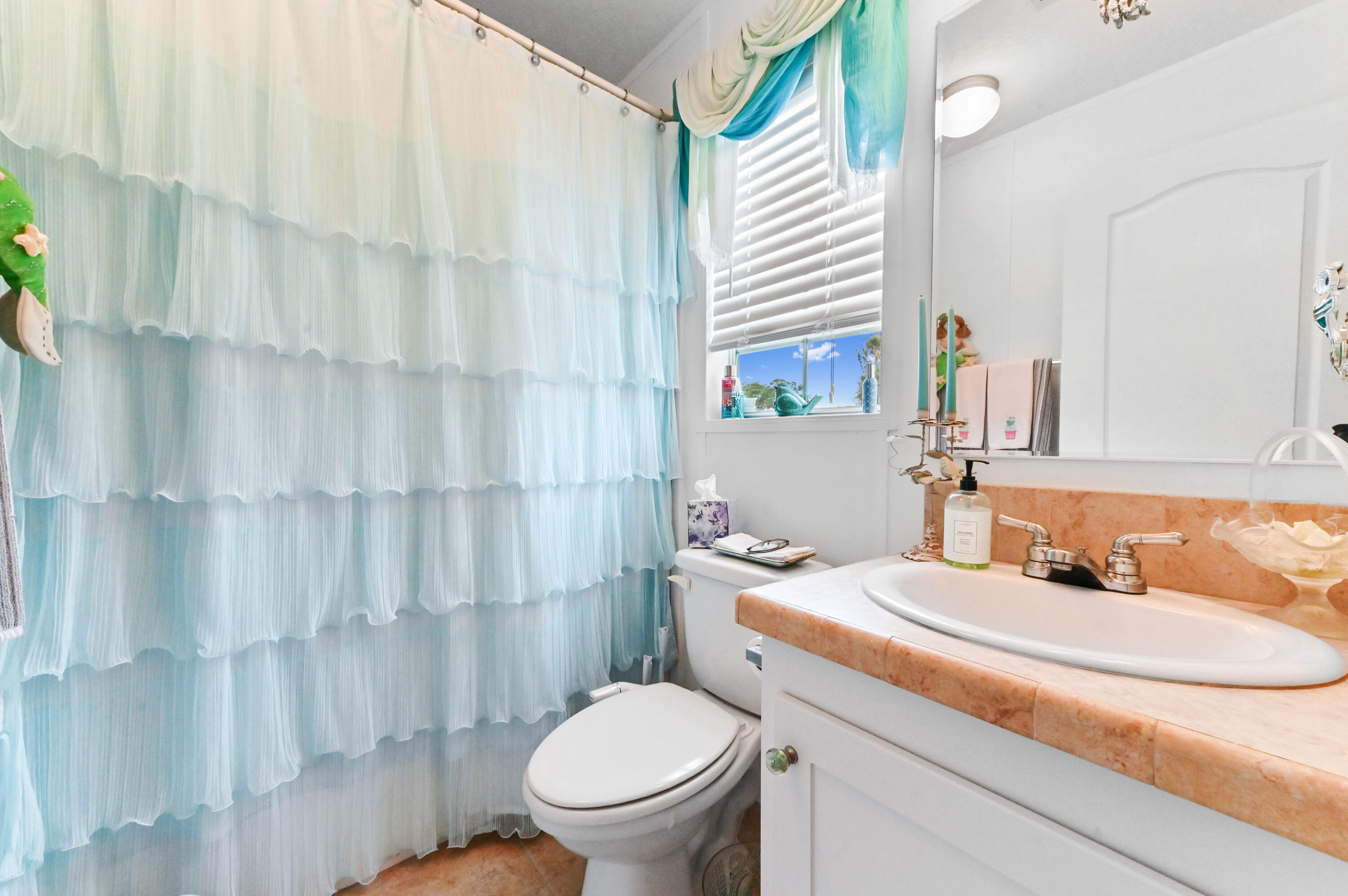 2 East View Street Lantana, FL 33462 - Photo 16 of 28 a bathroom with a sink toilet and shower