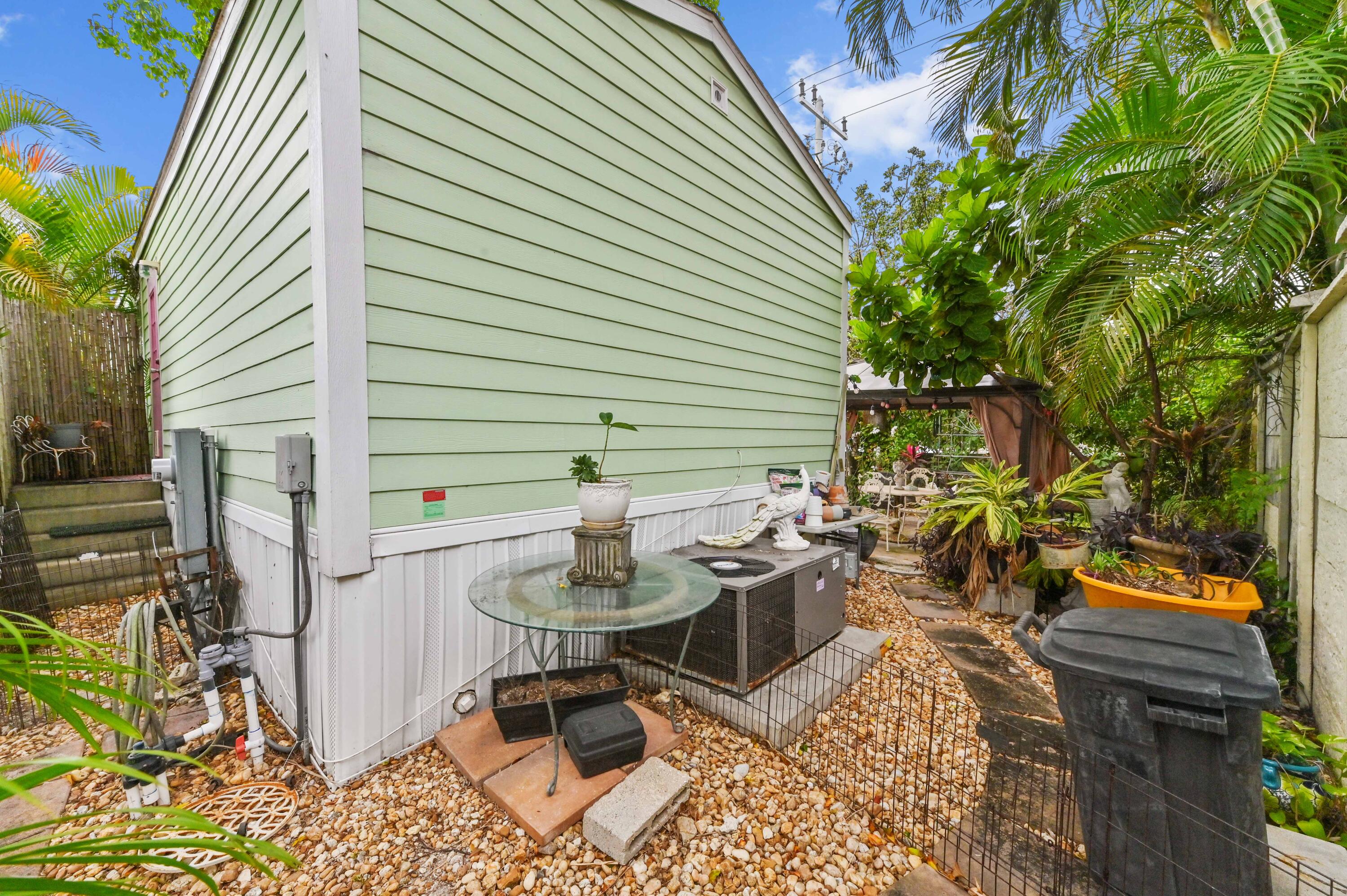 2 East View Street Lantana, FL 33462 - Photo 22 of 28 a view of a house with backyard and sitting area