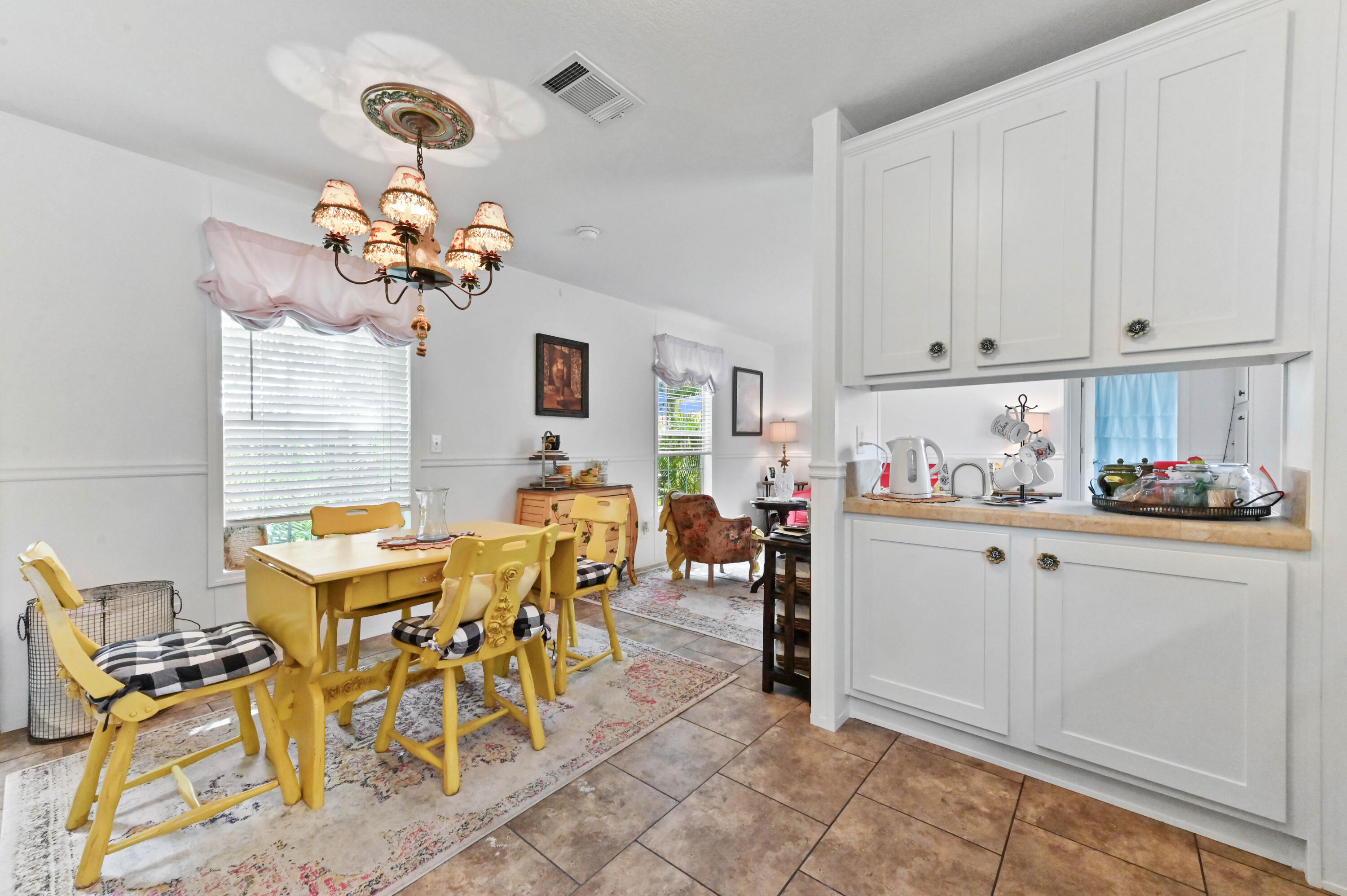 2 East View Street Lantana, FL 33462 - Photo 8 of 28 a view of a dining room with furniture and chandelier
