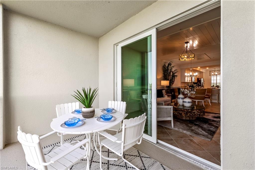 5651 Double Eagle Circle, Unit 4314 Immokalee, FL 34142 - Photo 20 of 20 a dining room with furniture and a potted plant
