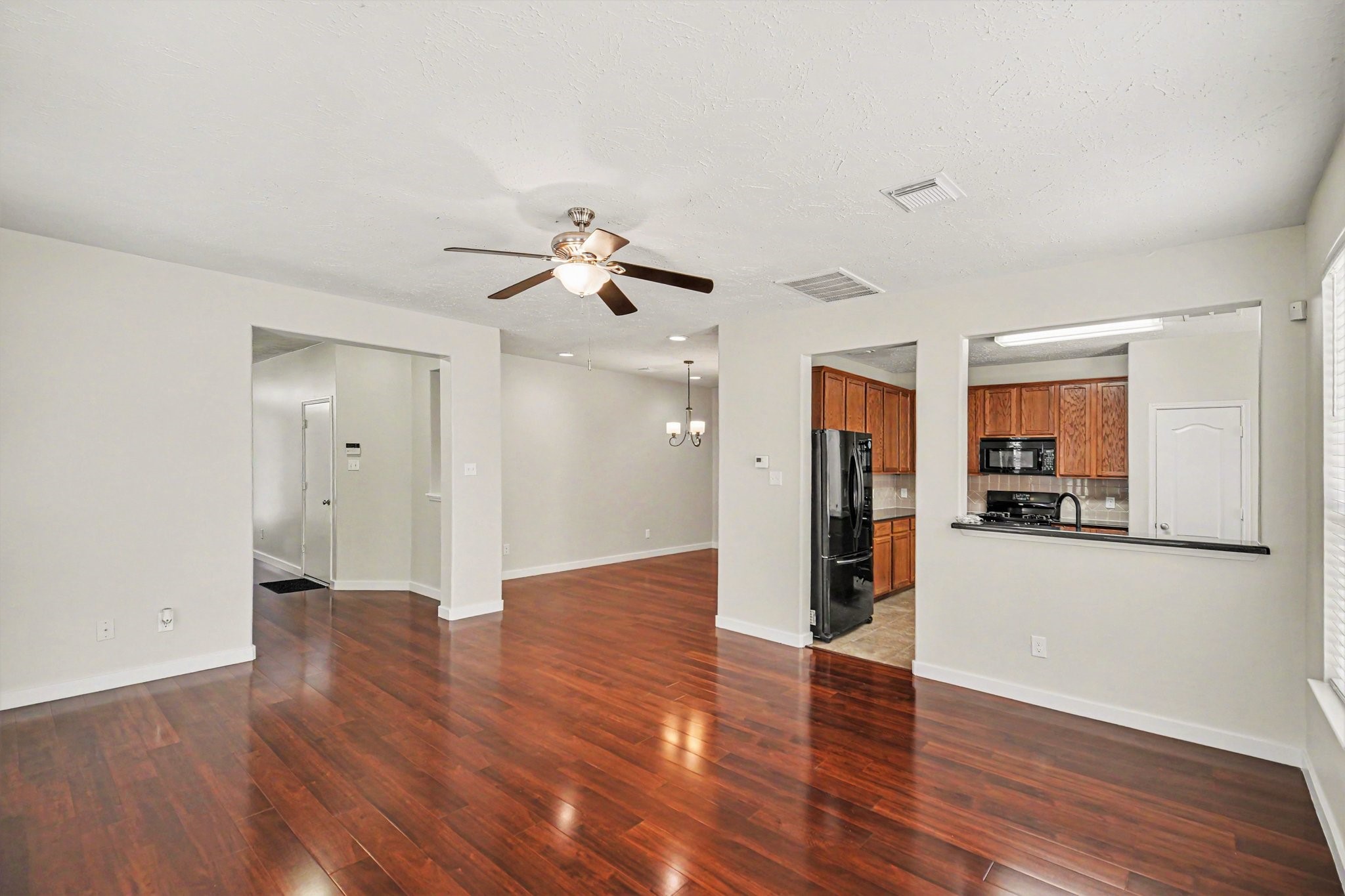 7419 Hollister Ridge Houston, TX 77040 - Photo 5 of 27 Wood and tile floors on the entire first floor. No carpet in this home.