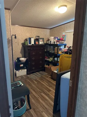 a bedroom with a bed and furniture