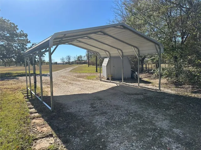 a view of balcony with couch and wooden floor