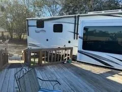 a kitchen with furniture and a fireplace