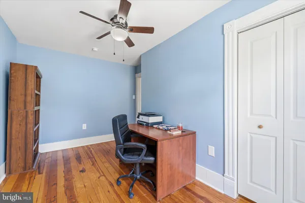 a room with furniture and a window