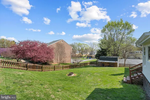 a view of a garden with a slide