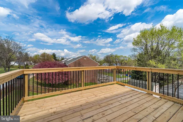a view of a wooden roof deck