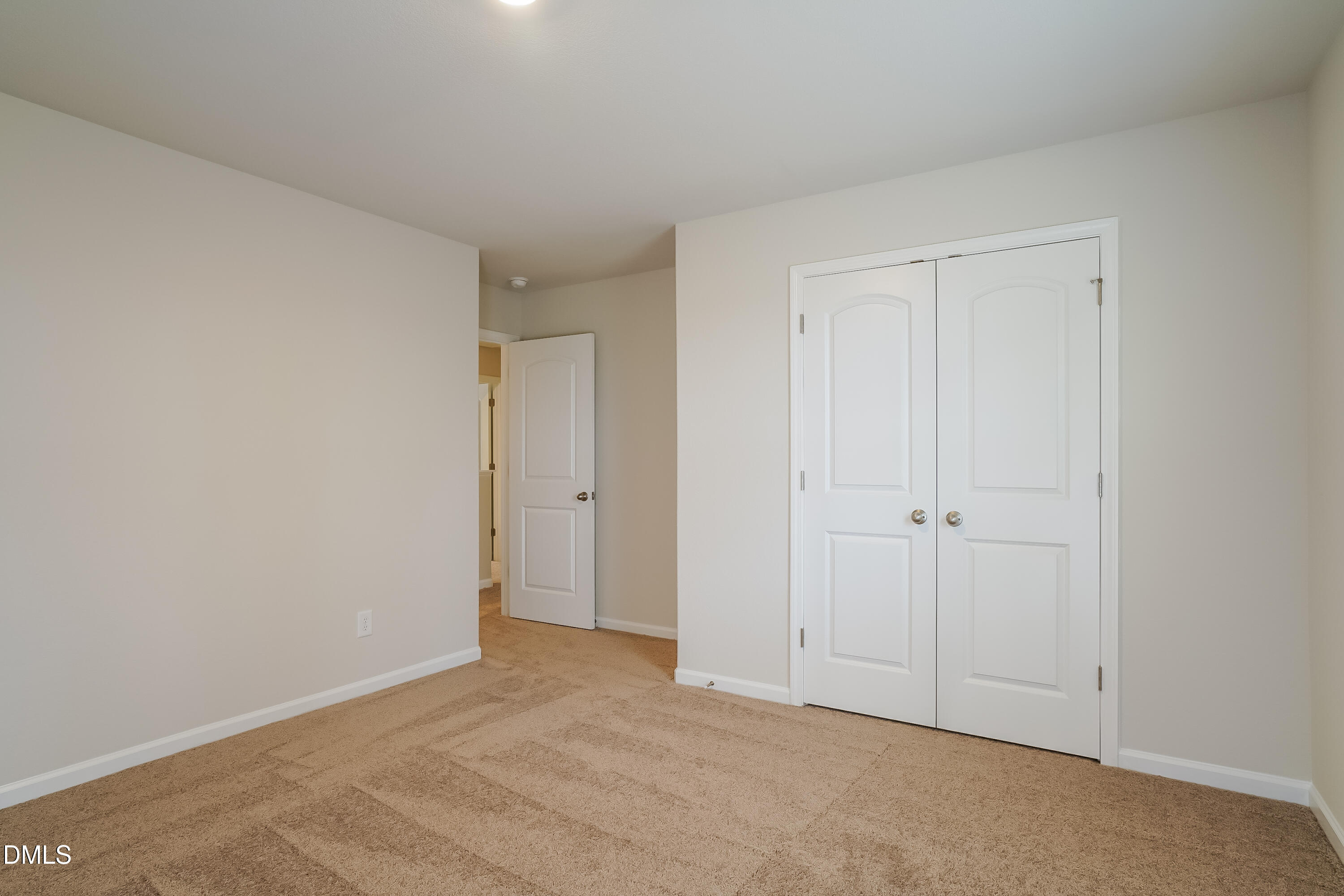 541 Gusty Lane Zebulon, NC 27597 - Photo 11 of 17 a view of an empty room and closet area
