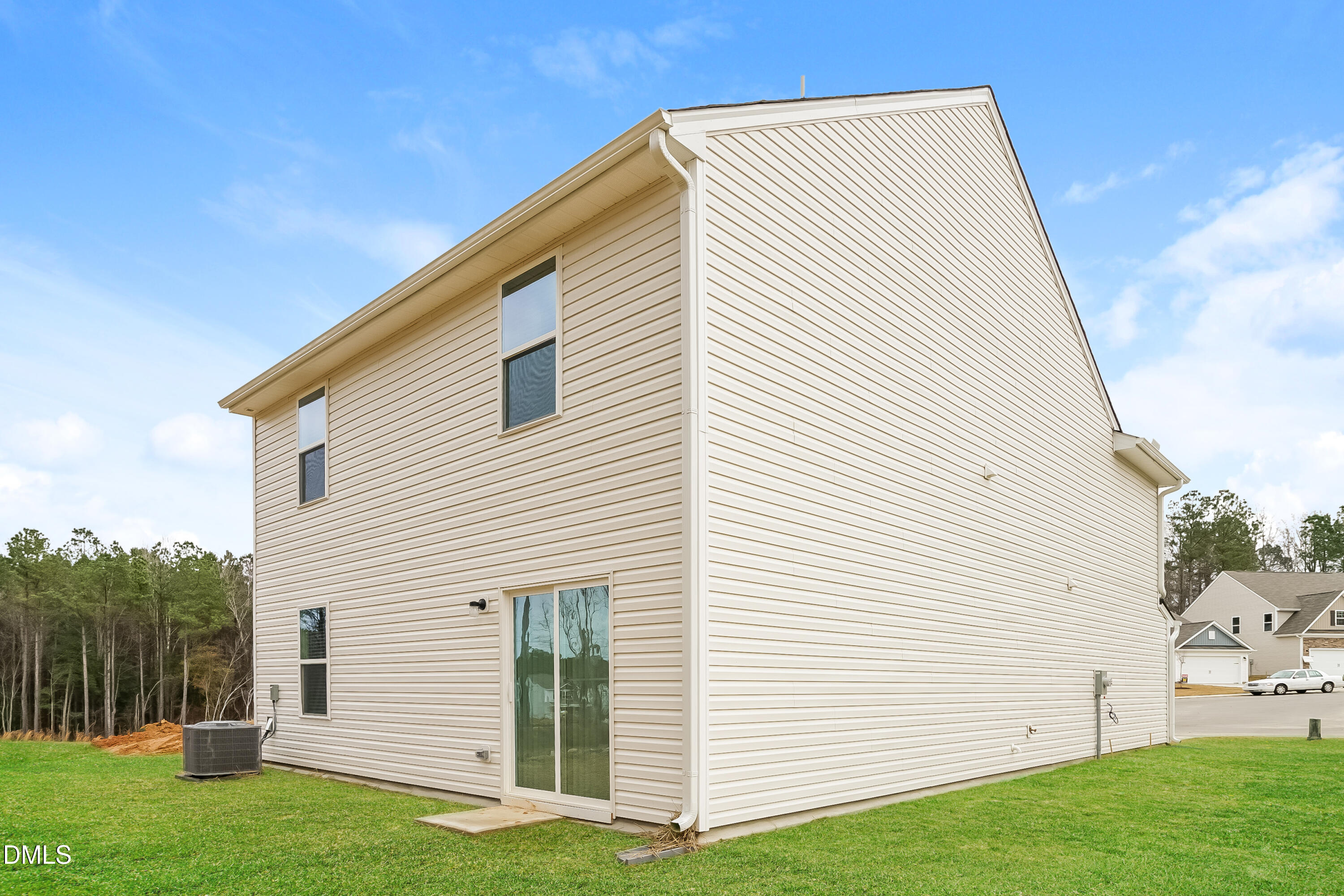 541 Gusty Lane Zebulon, NC 27597 - Photo 15 of 17 a view of house with backyard
