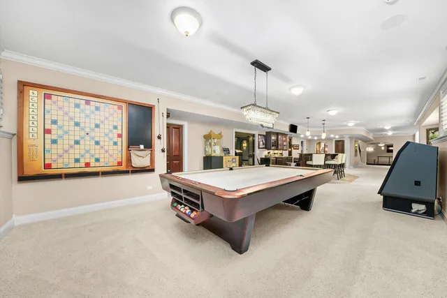 a spacious bedroom with a large bed and a fireplace