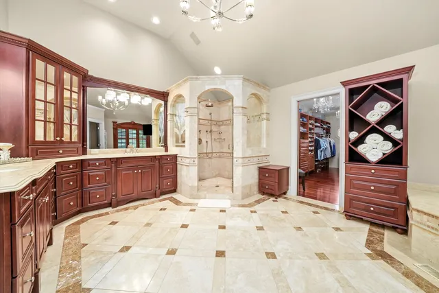 a view of a livingroom with furniture and a chandelier