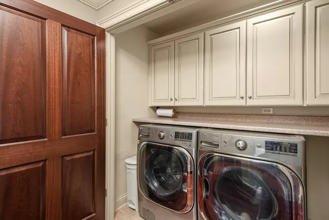 a view of a ocean with a bench and a couch