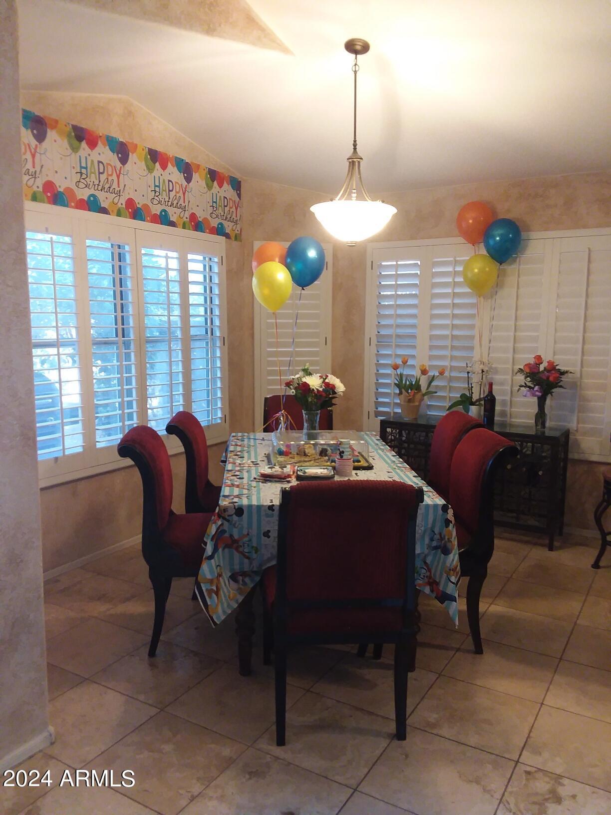 7665 West Boca Raton Road Peoria, AZ 85381 - Photo 6 of 25 Bigger table in kitchen