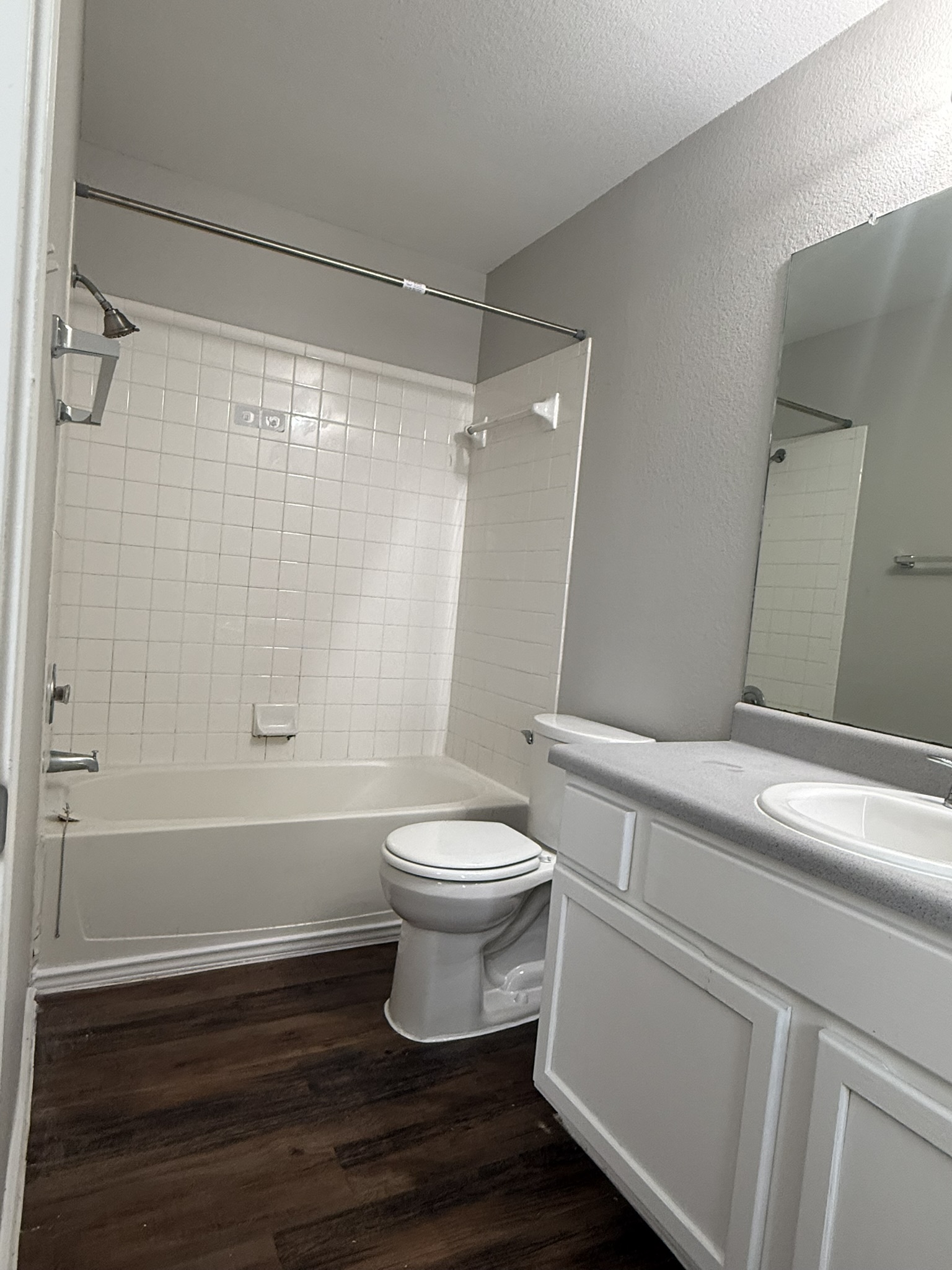 6726 Windrift Way, Unit A Austin, TX 78745 - Photo 20 of 29 a bathroom with a toilet and a shower