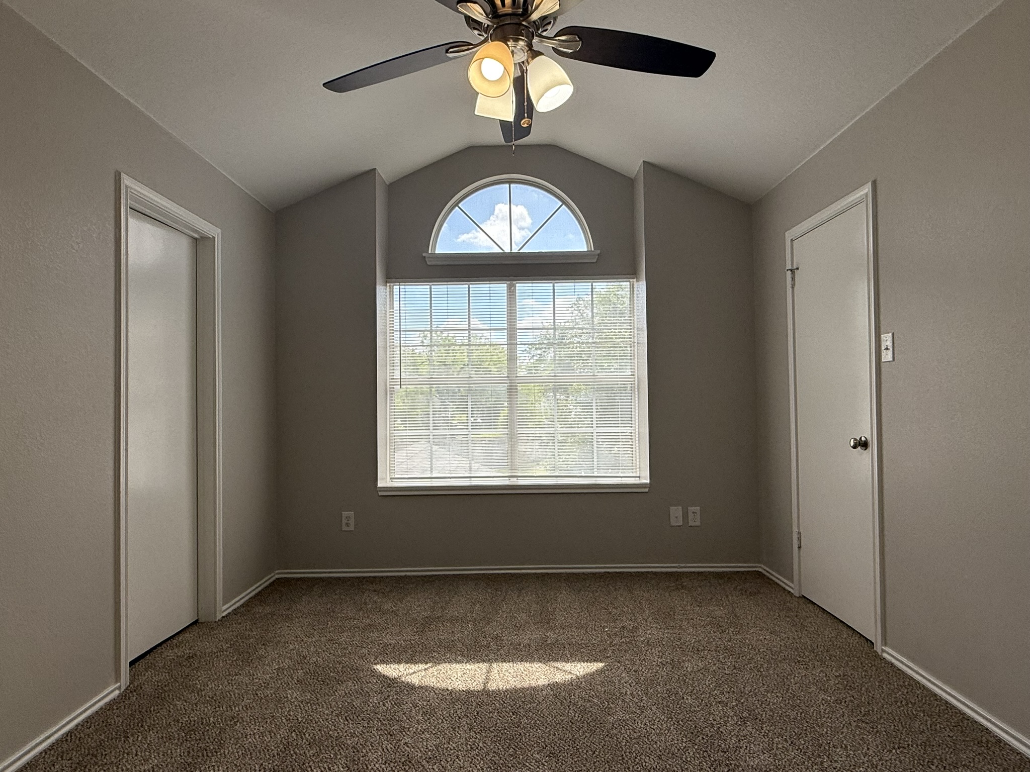 6726 Windrift Way, Unit A Austin, TX 78745 - Photo 23 of 29 an empty room with a window