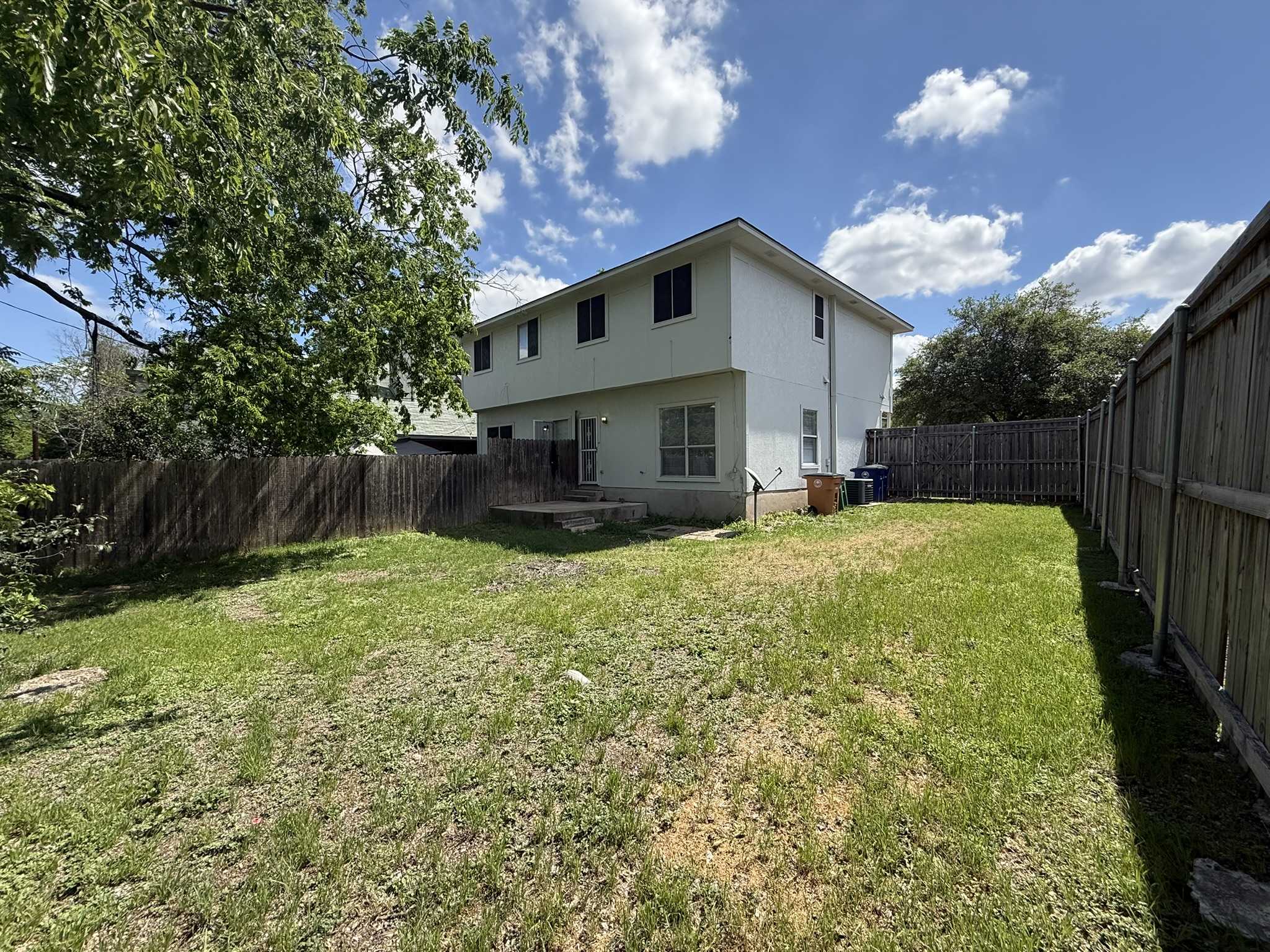 6726 Windrift Way, Unit A Austin, TX 78745 - Photo 26 of 29 a view of a house with backyard and garden