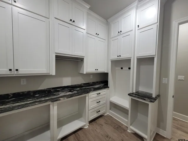 a view of a yard with a tree