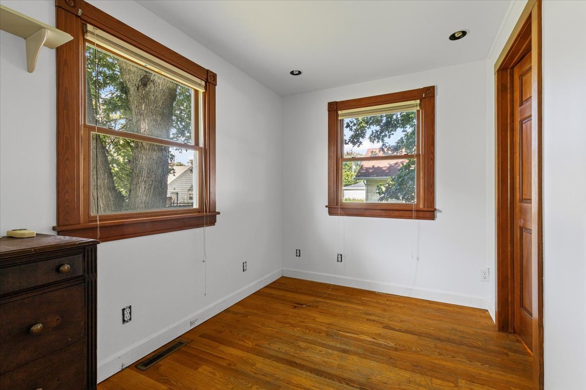 717 Edward Street Sycamore, IL 60178 - Photo 11 of 21 a view of an front door and wooden floor